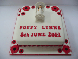 Poppy christening cake